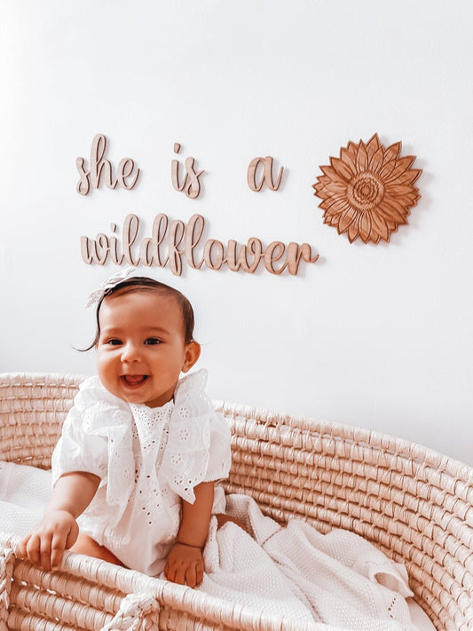 She is a wildflower wall plaque
